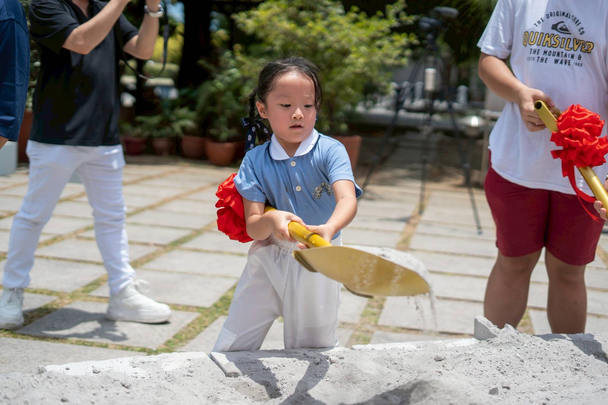 Everybody was invited to participate in symbolic shoveling at the groundbreaking site.