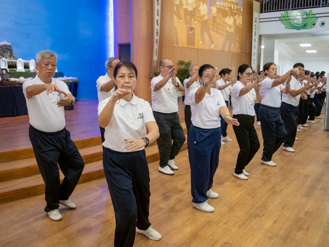 At the Jing Si Auditorium, Tzu Chi’s Tai Chi group lead everyone to perform meditative moves. 