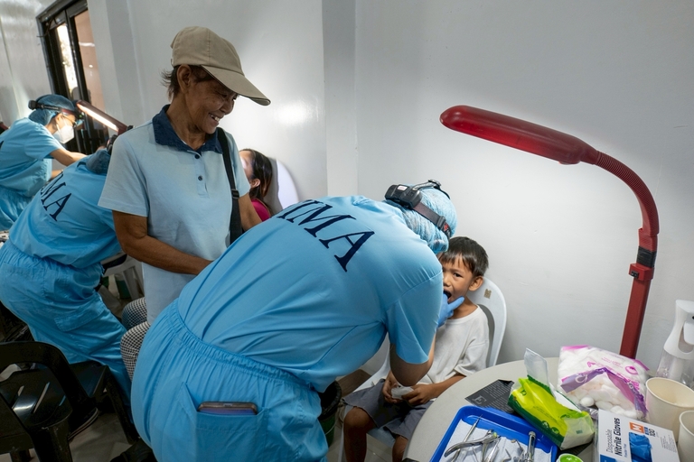 Beneficiary Juana Valdez accompanied her grandchild to the dental section for a tooth extraction after her own consultation at general medicine for back pain.