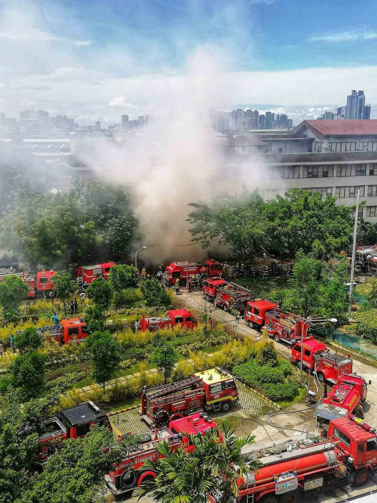 Fire raging at the building as seen from the top floor of Synergy Hall. 【Photo by Daniel Lazar】