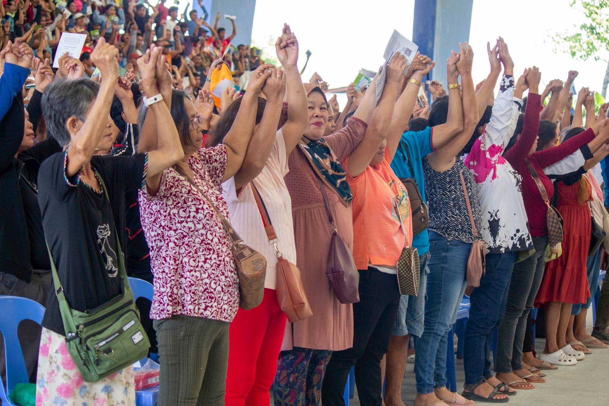 Residents from various barangays in Iligan City come together, standing united as they begin to rise after the calamity.