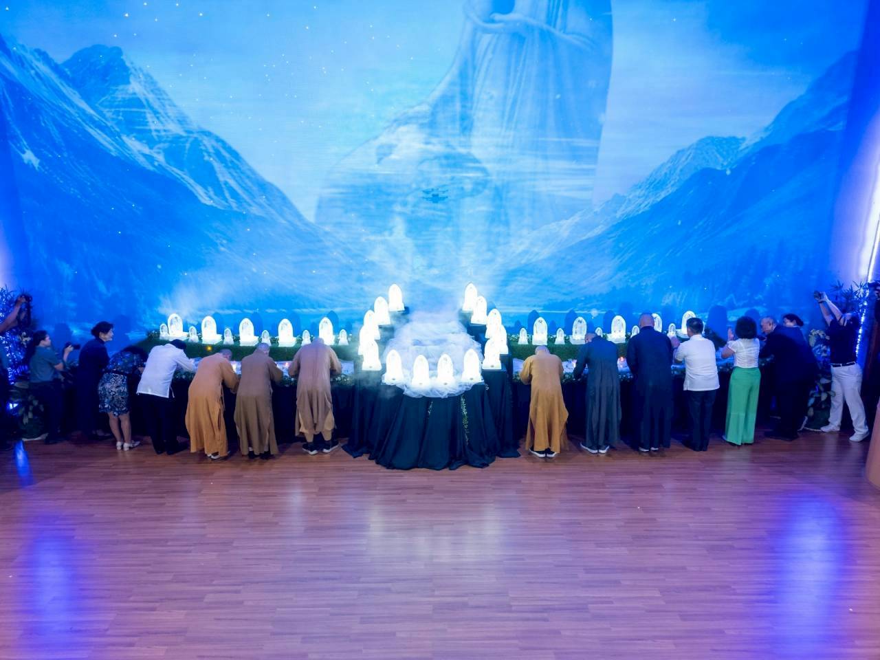 Dharma Masters from Taiwan and special guests lead in the solemn Buddha Bathing Ceremony. 