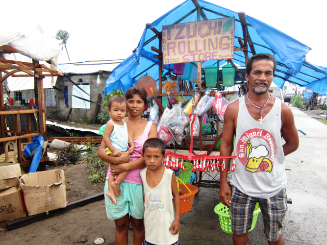 From “Remember Yolanda”: A family starts their business with cash given by Tzu Chi.