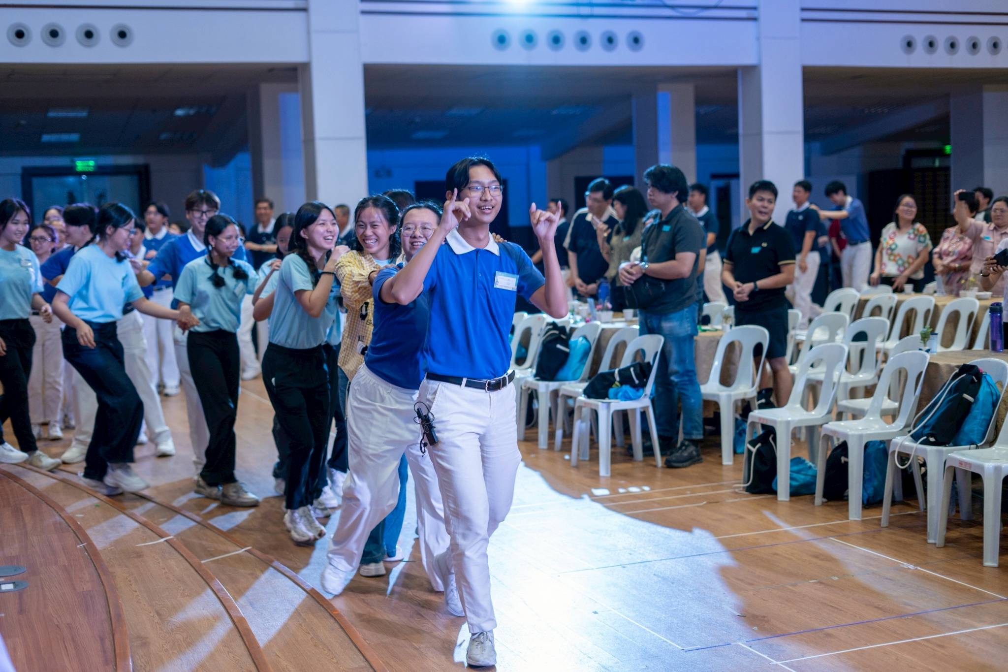 TCY Camp Head Jedd Lee leads the “Pulling the Ox Cart,” a Tzu Chi song and dance symbolizing how working together can result in great accomplishments. 