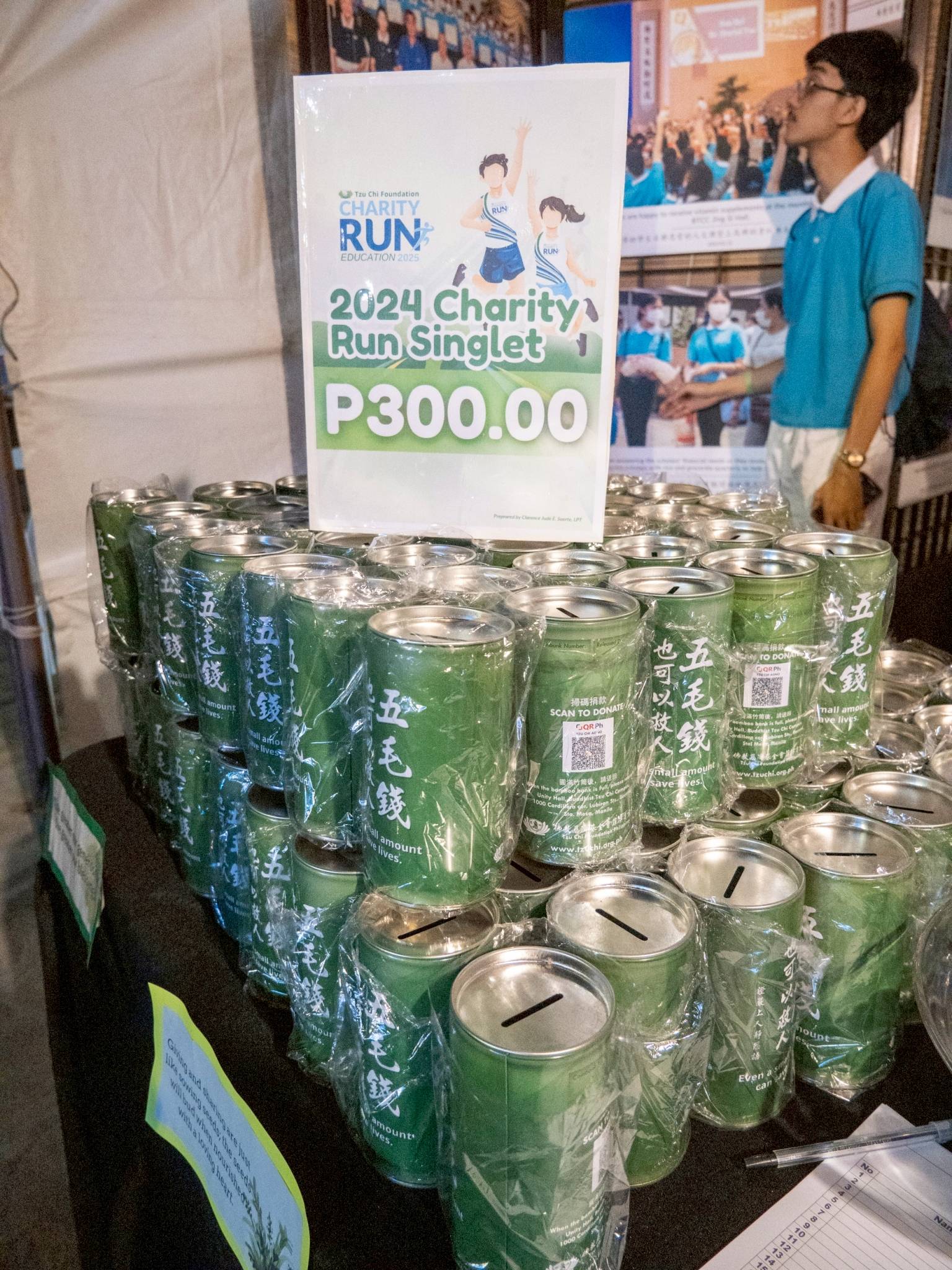 Coin cans and other charity run merchandise were sold at the scholars’ booth during the event.