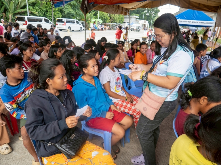 Upon arrival, the Mangyans were assisted with registration and guided through the process, with some volunteers offering support in writing. 