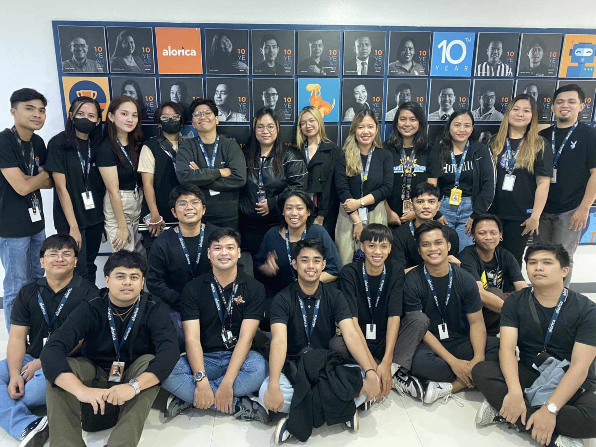 Gerald Seciban (first row, center) during his work as a call center agent.