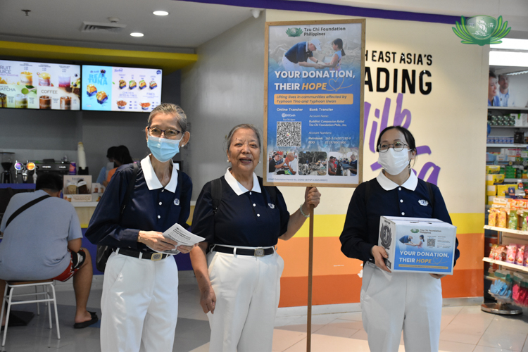Volunteers stand at strategic points of Metro Department Store and supermarket to invite as many shoppers to donate.