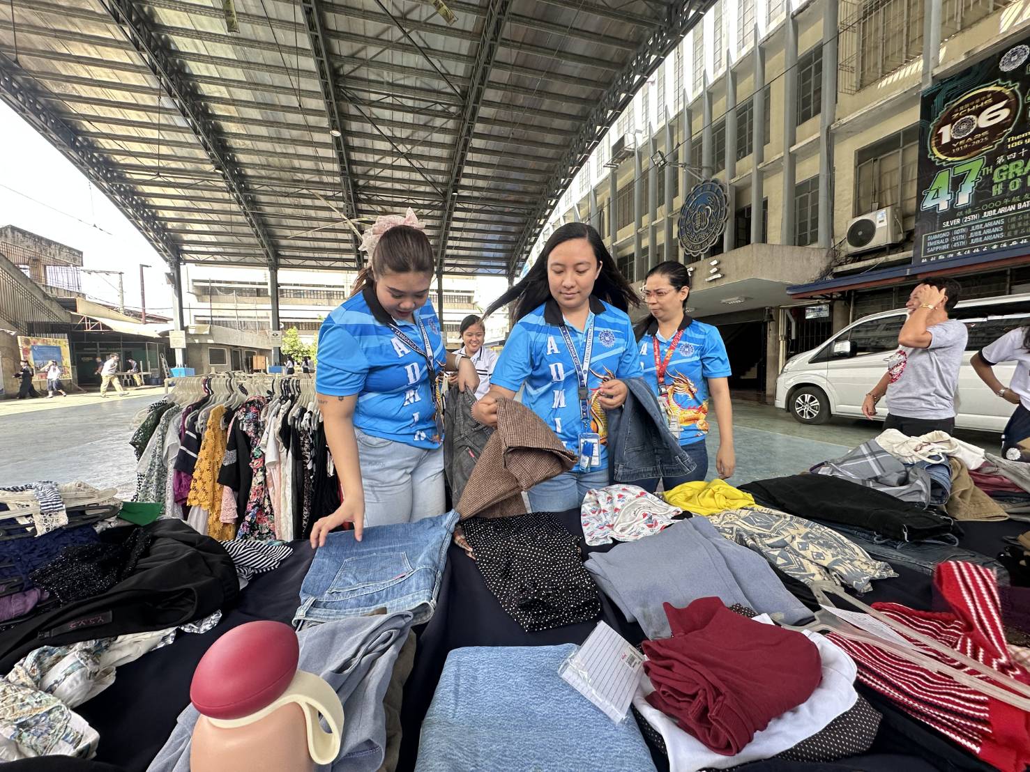 Staff from Zamboanga Chong Hua High School begin digging through the items hoping to find hidden gems.