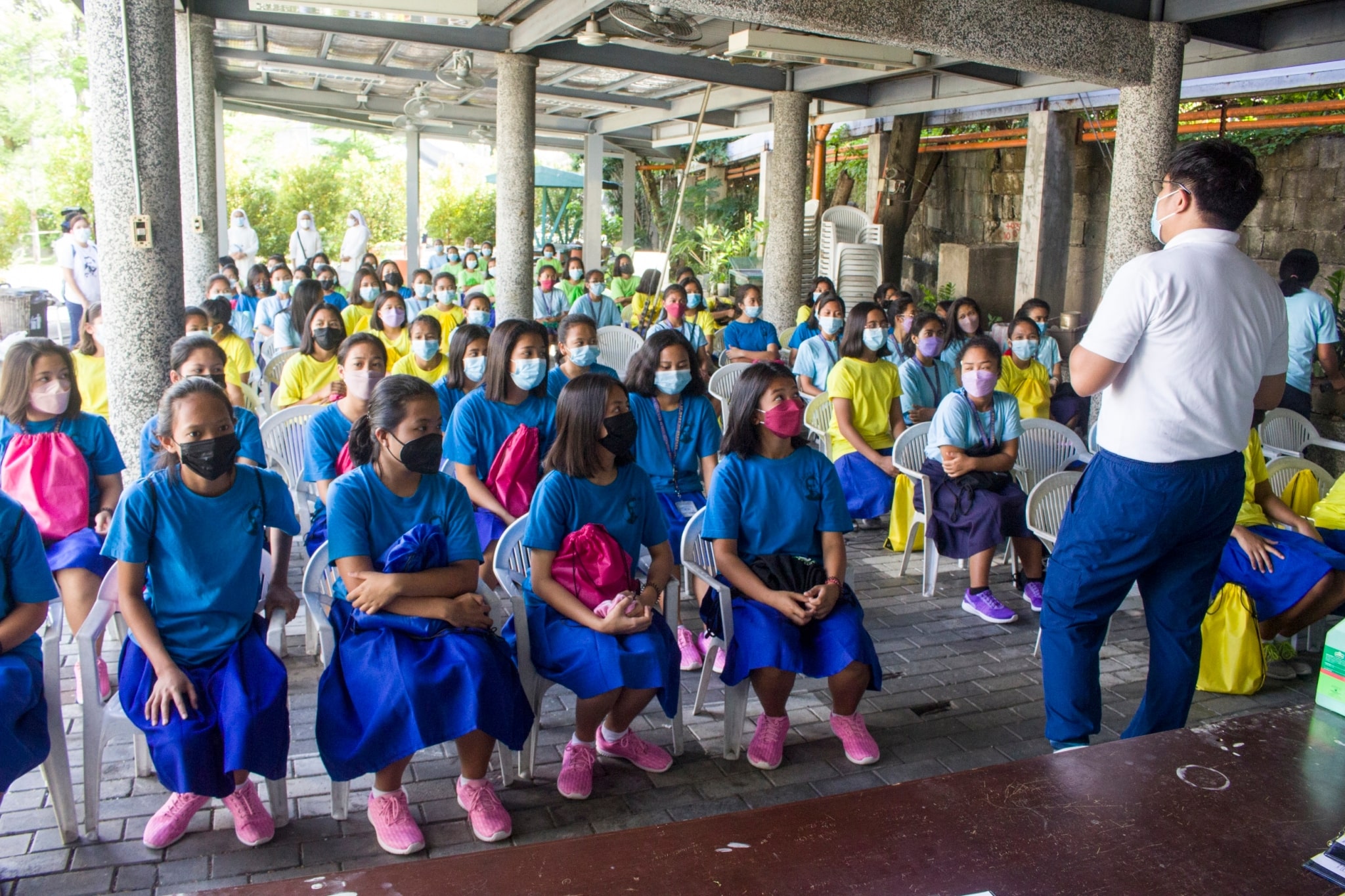 Girlstown students receive instructions before undergoing their eye checkup.【Photo by Matt Serrano】