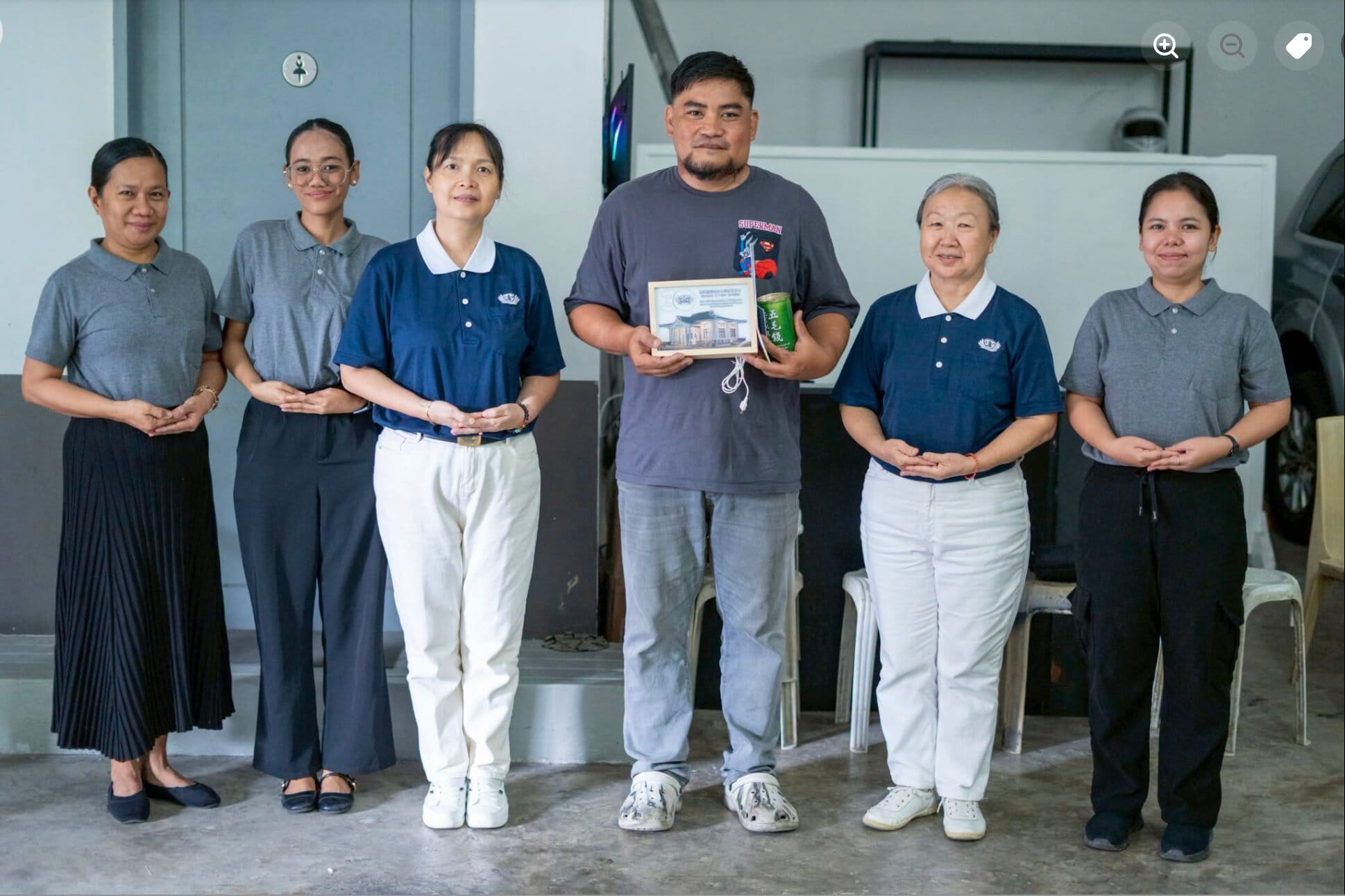 Flanked by Tzu Chi volunteers and staff, Mechel Banga appears confident and well following the surgical removal of a benign tumor on his left jaw. The procedure was funded by Metrobank.