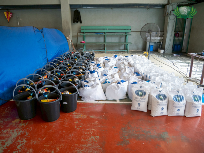 Sacks of rice, clothing, and buckets containing groceries and home supplies were given to the beneficiaries.