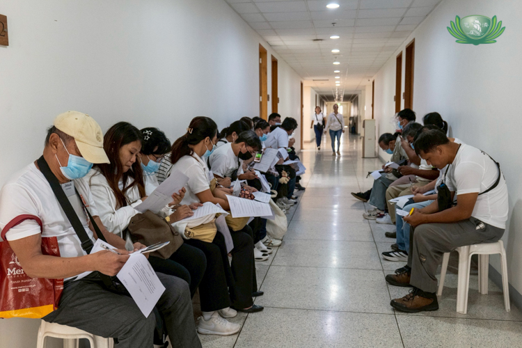 Medical assistance beneficiaries fill up forms to avail of Philhealth’s YAKAP, its enhanced primary care benefit package. 