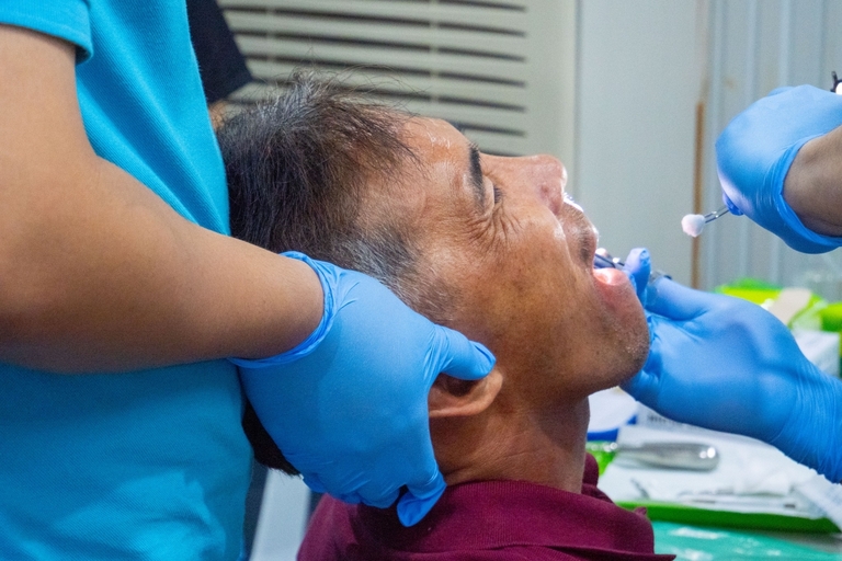 Dentists take care of patients by keeping them comfortable during extractions.