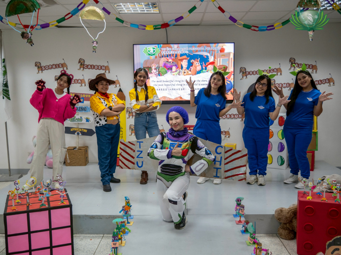 Tzu Chi Great Love Preschool Philippines teachers and staff perform a skit dressed as characters from Toy Story.