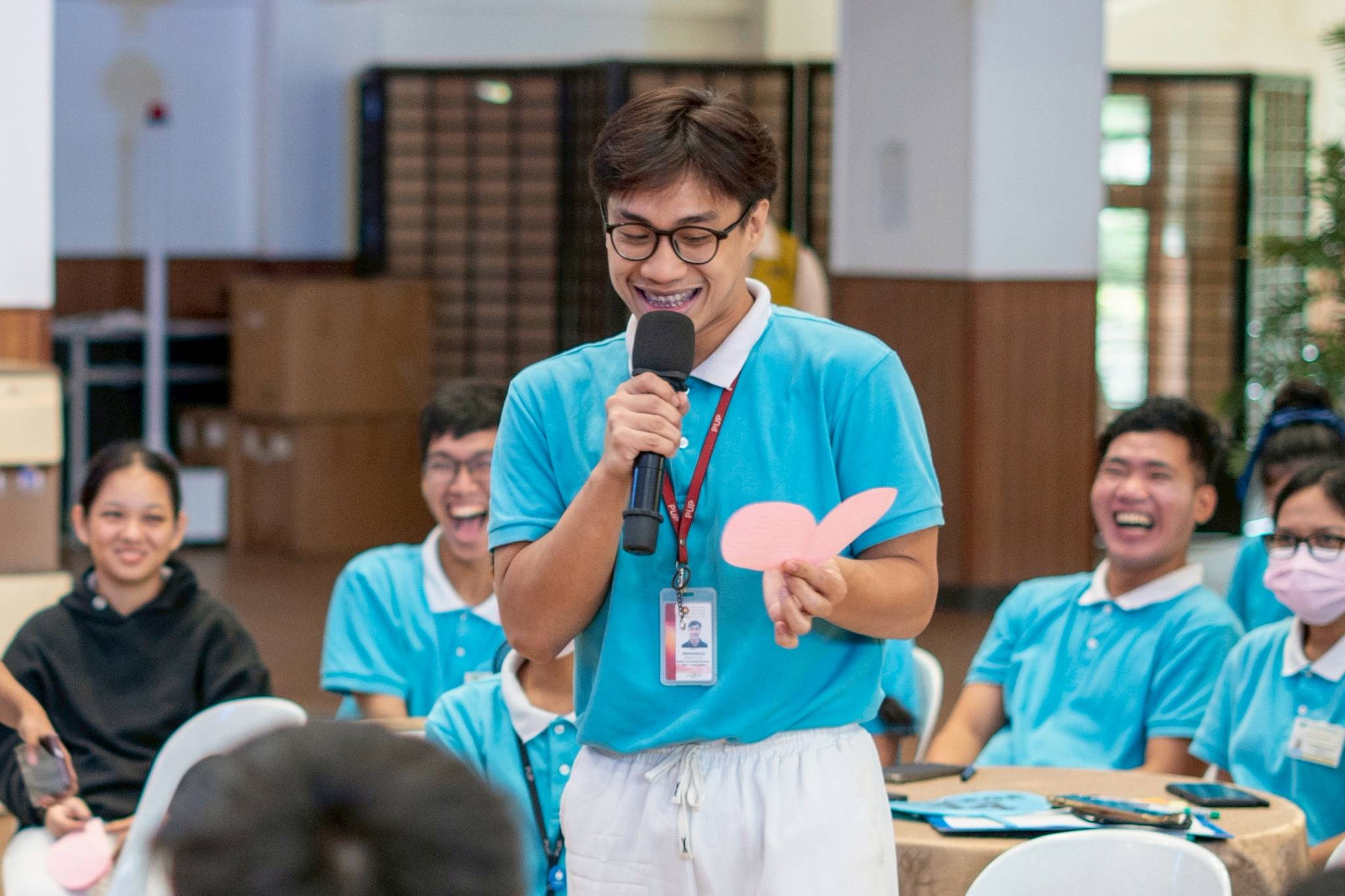 Scholars took turns reading what their fellow scholars wrote to them on their paper heart. 