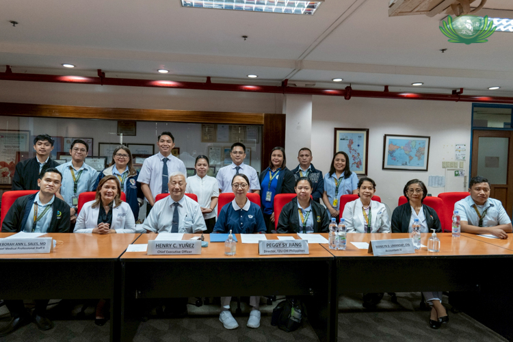 Representatives from Tzu Chi and QMMC take a group photo after a successful MOA signing.