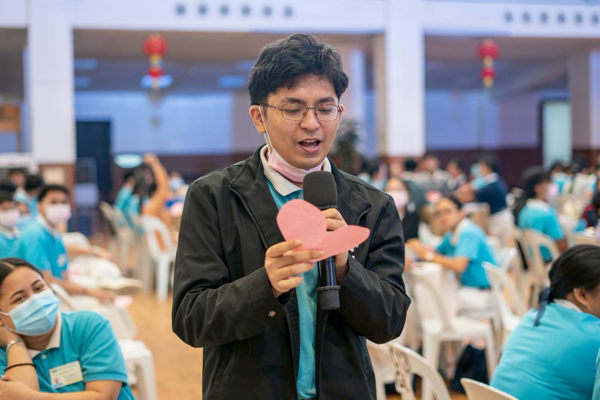 Scholars took turns reading what their fellow scholars wrote to them on their paper heart. 