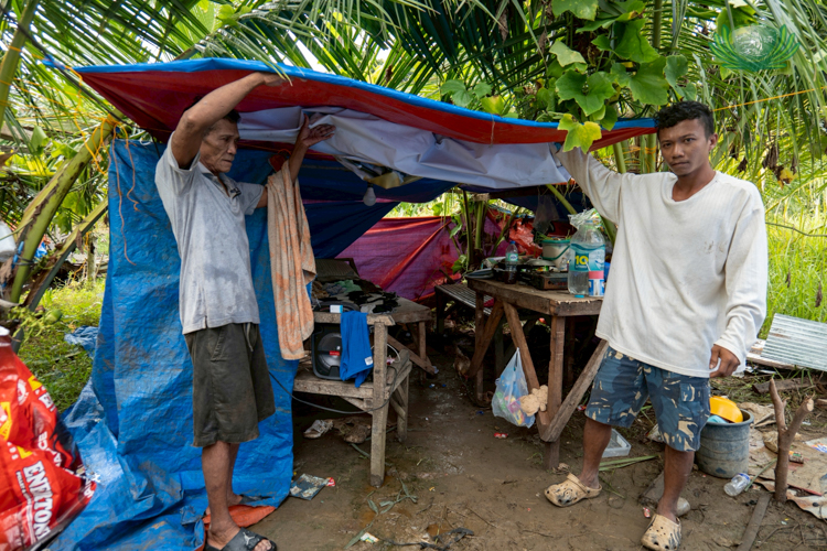 Currently, Apolinario Fuentes and his family live in a makeshift tent across the street from their home.