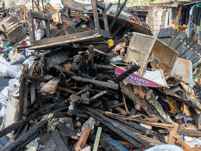 Many damaged materials lay after the fire incident at Barangay Damayang Lagi, Quezon City.【Photo by Marella Saldonido】