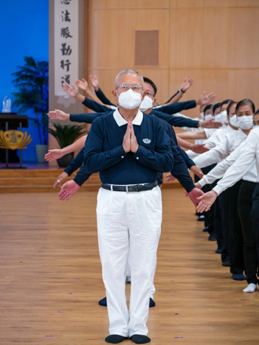 Male volunteers in formation【Photo by Daniel Lazar】