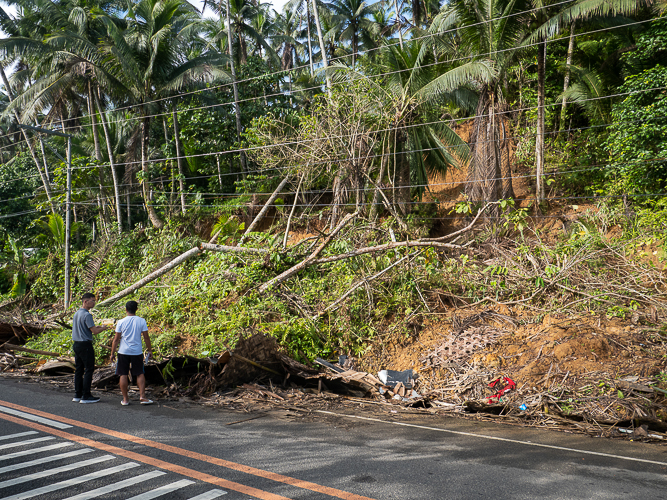 Gerry Hibon loses his home and sari-sari store in Brgy. Bayho, Lope de Vega, to a landslide triggered by incessant rains. 【Photo by Matt Serrano】