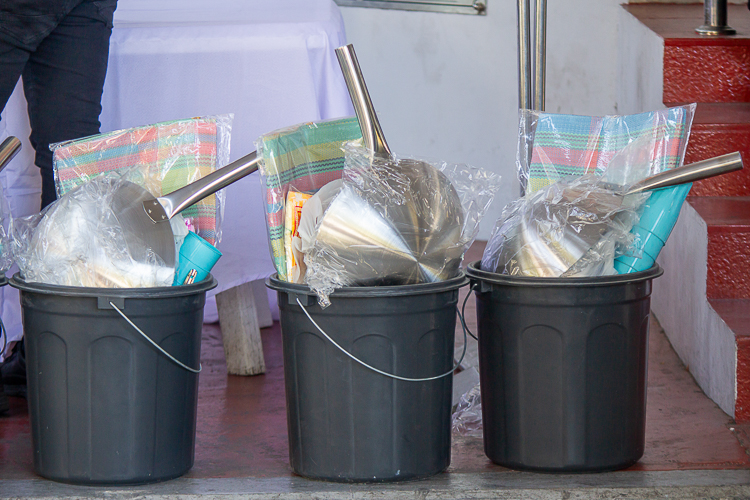 Each family receives a 10-kilogram sack of rice, a Puregold voucher worth P500, toiletries, biscuits, and other household items such as a blanket, sleeping mat, pail, casserole, frying pan, spatula, plates, drinking cups, spoons, and forks. 【Photo by Marella Saldonido】