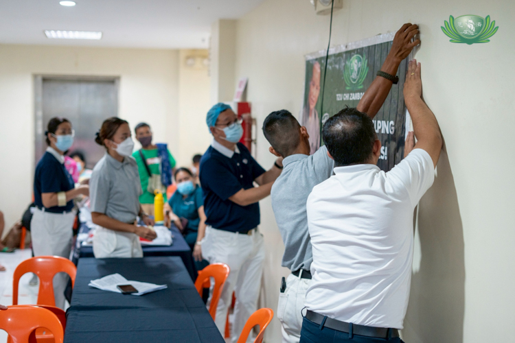 Volunteers help prepare for the medical mission.