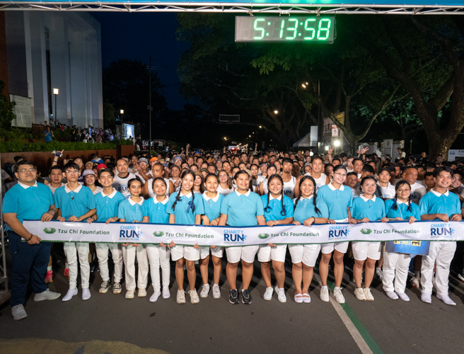 Tzu Chi scholars kept runners at the starting line of every race category.