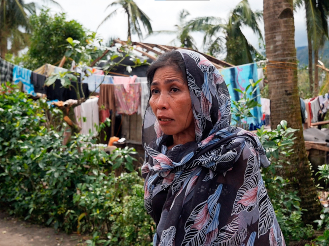 “Thank you to the Tzu Chi Foundation for coming to our place. You’re the first to visit us, so thank you,” says Myrna Sales of Barangay Umiray. 【Photo by Harold Alzaga】