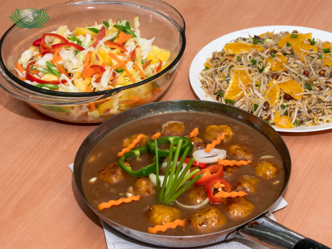 Vegetable salad with stir fried beans sprouts and sauteed mushrooms in sauce【Photo by Daniel Lazar】