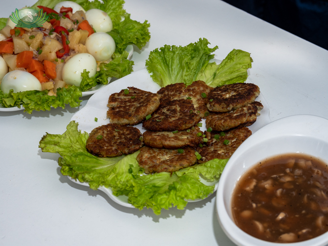 Veggie eggplant burgers with poached eggs and sauce【Photo by Daniel Lazar】