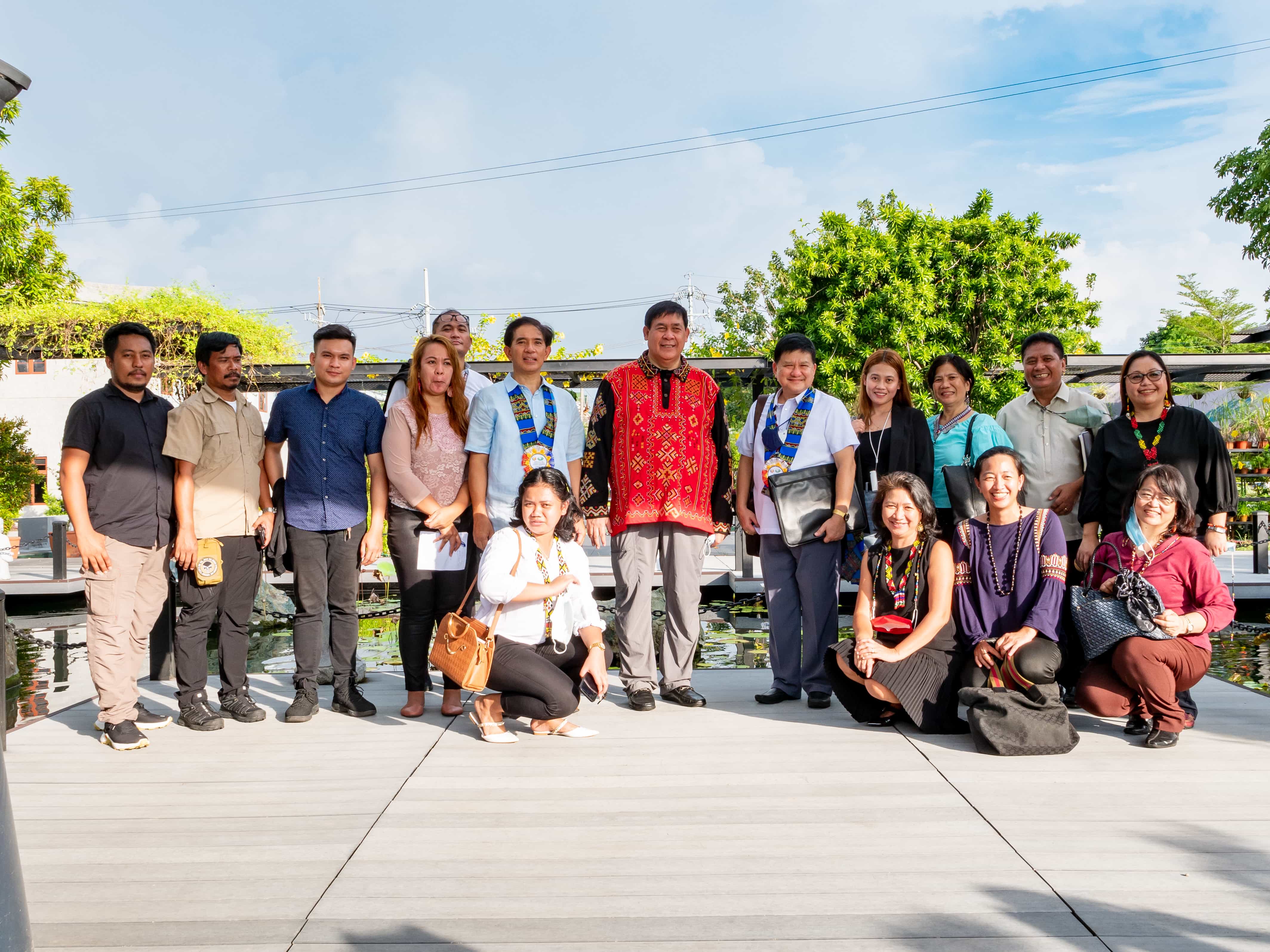 Group photo of NCIP delegates by the pond.【Photo by Daniel Lazar】