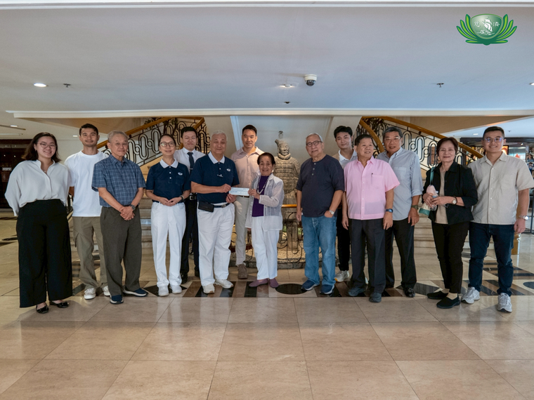 Representatives from Angelo King Foundation, Inc. (AKFI) and Tzu Chi Foundation Philippines gather for a group photo during the turnover of a P3 million donation from AKFI to Tzu Chi for its livelihood program for residents of Tzu Chi Palo Great Love Village in Leyte. Tzu Chi Philippines CEO Henry Yuñez (sixth from left) receives the check from Dr. Mercedita Macabulos, former medical officer of the Department of Education, Culture, and Sports-National Capital Region.  