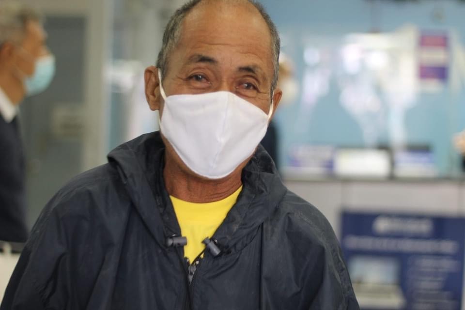 Beneficiaries, like this man, will use the cash aid to rebuild their homes that were wiped out by the powerful Typhoon Odette.
