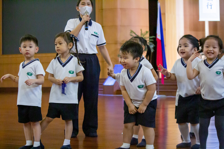Cuteness overload and contagious smiles light up the room as students bust a move in the classic freeze dance competition. 【Photo by Marella Saldonido】
