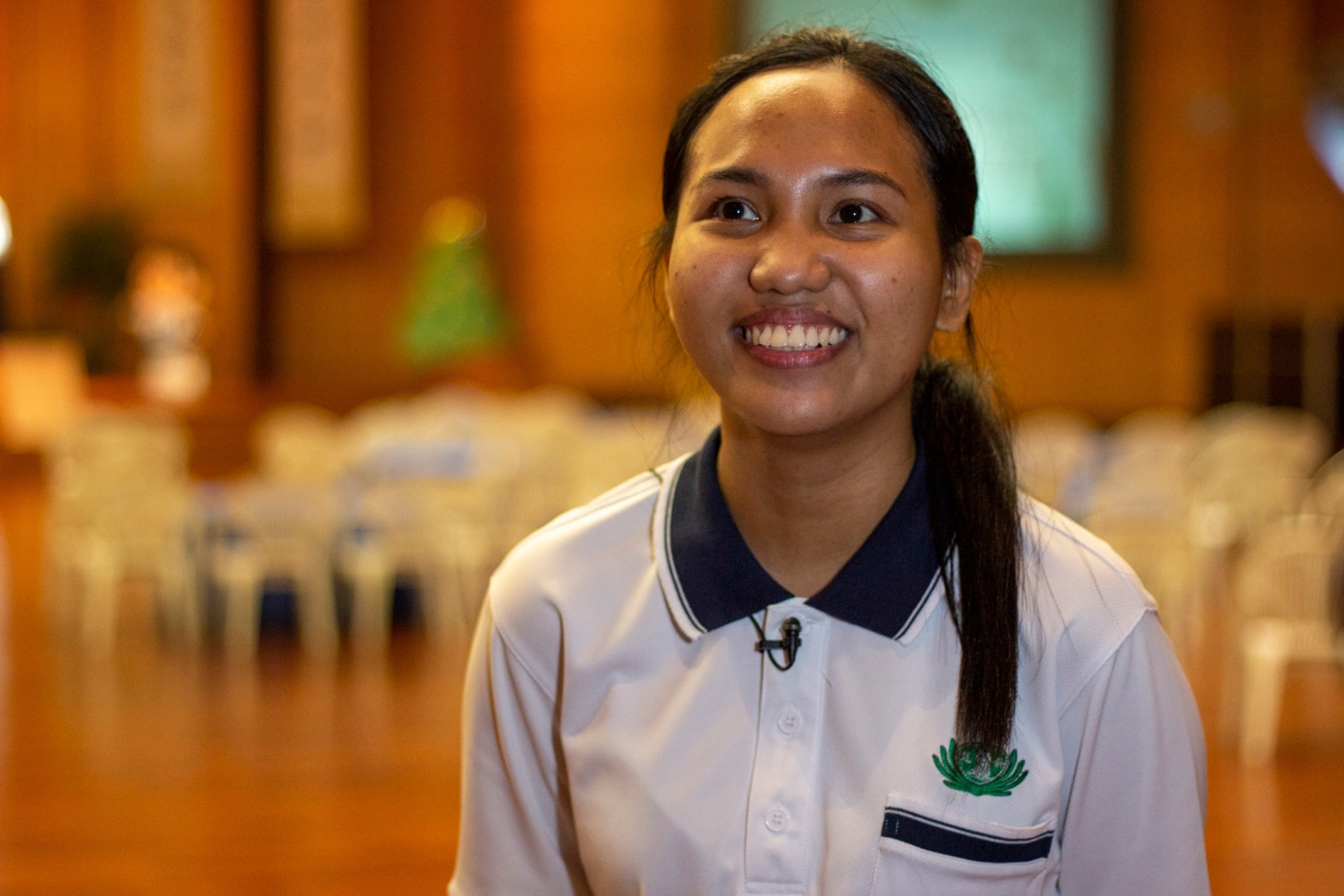 “I get to bond with the children as well as their families. We’re creating a sense of community wherein we are able to give back to other people who are less fortunate,” says grateful Nursery Teacher Christine Pauline Paje. 【Photo by Matt Serrano】