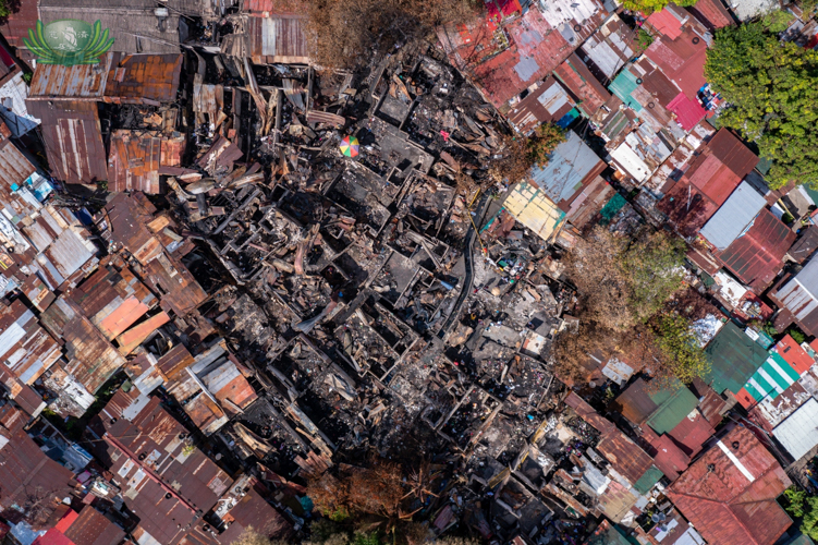 Aerial shot of the neighborhood in Brgy. UP Campus Village A that was razed to the ground by fire on May 2, 2022. 【Photo by Daniel Lazar】