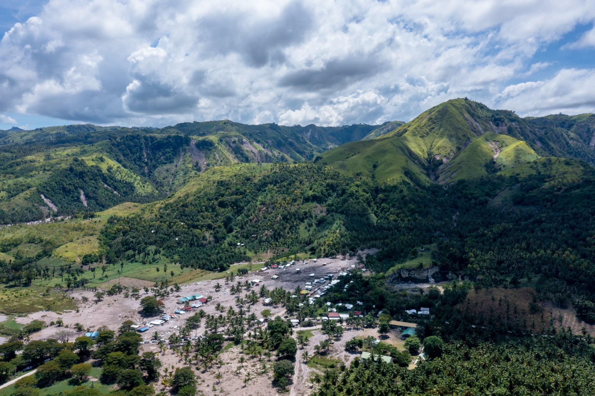 Aerial shot of the landslide site in Brgy. Kusiong, Datu Odin Sinsuat, Maguindanao del Norte. 【Photo by Daniel Lazar】