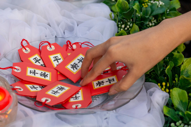 Instead of fresh fruits, participants of the Buddha Bathing ceremony each picked up a blessing charm. 