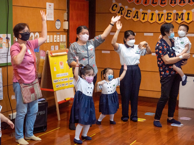 Grandparents join the students in a dance energizer. 【Photo by Matt Serrano】
