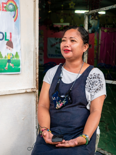 “Nothing compares to the joy of helping, especially when you see them crying in joy and thanking you. I feel my heart grows larger,” says Geneve Aumentado, Tzu Chi Daycare teacher and volunteer. 【Photo by Daniel Lazar】