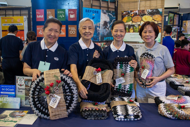 The upcycled multi-purpose mats, handwoven by Tzu Chi volunteers and charity beneficiaries using excess socks, contribute directly to the program’s beneficiaries through the proceeds from sales.【Photo by Marella Saldonido】