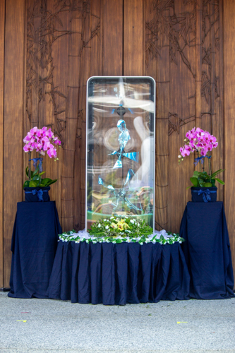 A holographic image of the Buddha is seen at the entrance of Jing Si Hall.