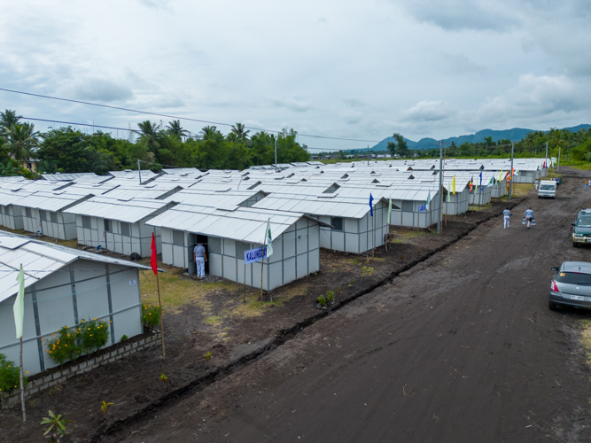 The village houses 100 prefabricated homes made up of typhoon-resilient steel frames and is supplied with electricity, water, and septic tank. 【Photo by Harold Alzaga】