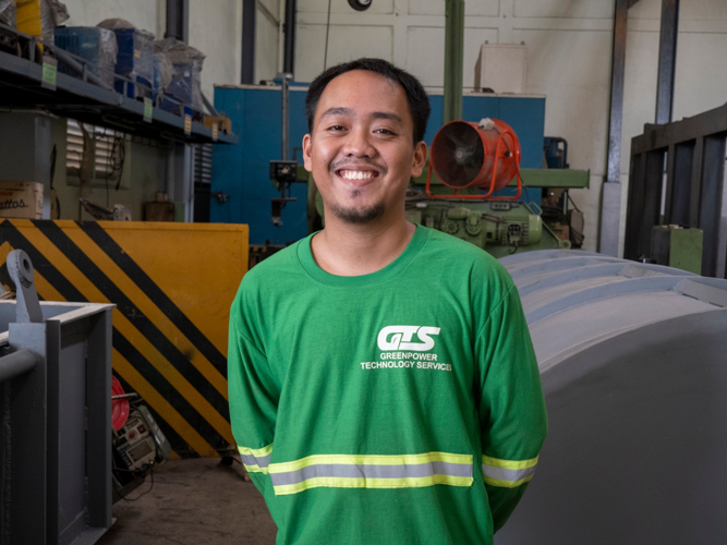 Novoh John Obligado at his internship site at Greenpower Technology Services in Sta. Rosa, Laguna. 【Photo by Matt Serrano】
