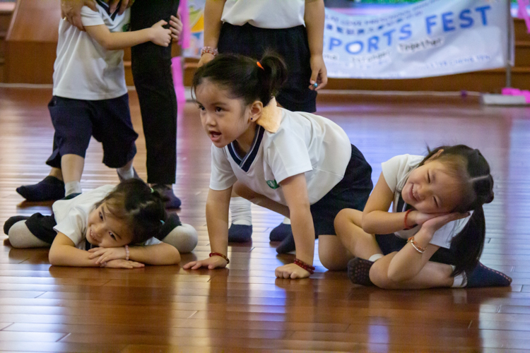 Cuteness overload and contagious smiles light up the room as students bust a move in the classic freeze dance competition. 【Photo by Marella Saldonido】